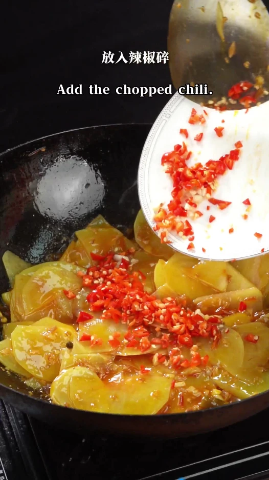 Add the chopped chili. Add the chopped chili.